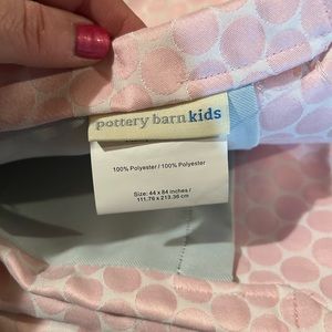 2 panels 44x88 inch, white w/pink polka dot w/ hooks and rings. Great condition.